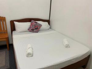 Postel nebo postele na pokoji v ubytování TheSoftbed Homestay
