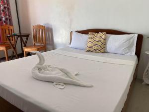 Postel nebo postele na pokoji v ubytování TheSoftbed Homestay