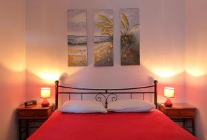 A bed or beds in a room at Ionia rooms