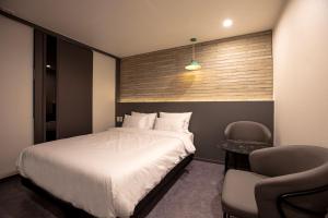 Postel nebo postele na pokoji v ubytování Luce Hotel + 14 fotografií