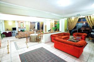 A seating area at Anastassiou Hotel - Bike and motorcycle friendly hotel