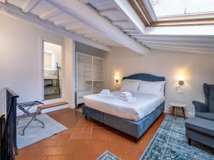 En eller flere senge i et værelse på Uffizi Suite + 48 billeder