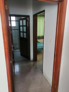Ένα ή περισσότερα κρεβάτια σε δωμάτιο στο Villa Rosa