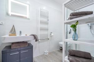 Koupelna v ubytování App 6 BugOase Ferienwohnung am Bug für 7 Gäste + 37 fotografií