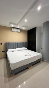 Postel nebo postele na pokoji v ubytování Hotel Gran Conquistador 33