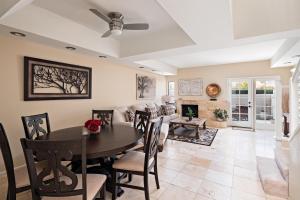 a dining room and living room with a table and chairs at Scottsdale - 6206 N 30th Pl in Phoenix