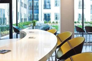 a conference room with a white table and chairs at S Boston 1BR w Doorman WD nr Seaport BOS-189 in Boston