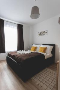 Ένα ή περισσότερα κρεβάτια σε δωμάτιο στο Jewish Quarter Hideaway with terrace and parking - 507