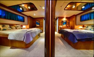 a bedroom with two beds in a boat at Hayat Bu, Boot in Fethiye