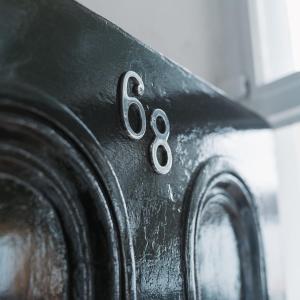 a black object with the number eight on it at Apartment at 68 in Saintfield