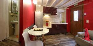 A kitchen or kitchenette at Ionia rooms