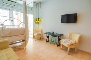Televízia a/alebo spoločenská miestnosť v ubytovaní The Loft by Hello Homes Sitges
