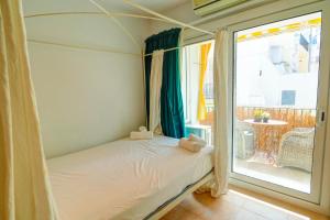 Posteľ alebo postele v izbe v ubytovaní The Loft by Hello Homes Sitges