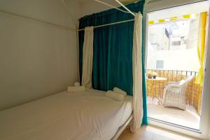 Posteľ alebo postele v izbe v ubytovaní The Loft by Hello Homes Sitges