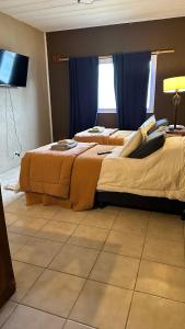 Ένα ή περισσότερα κρεβάτια σε δωμάτιο στο Room