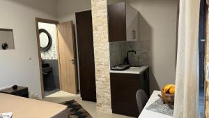 Koupelna v ubytování Aristos Apartments & Suites