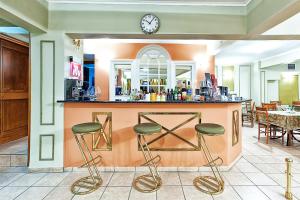 A restaurant or other place to eat at Anastassiou Hotel - Bike and motorcycle friendly hotel