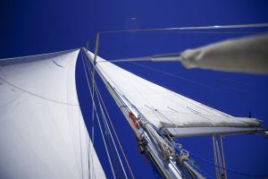 a close up of a white sail on a boat at XSail mediterraneo sport experience in Piombino