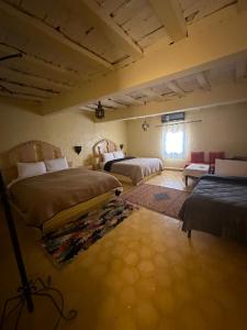 Cama o camas de una habitación en Kasbah Erg Chebbi
