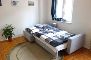 Кровать или кровати в номере 2R-Wohnung am Rande der Neustadt
