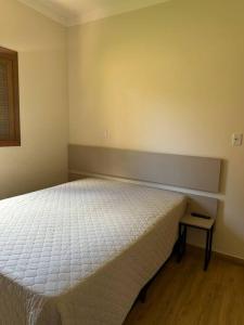Postel nebo postele na pokoji v ubytování Casa de campo com vista para Serra da Mantiqueira