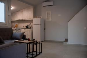 Кухня или мини-кухня в NV HOUSE
