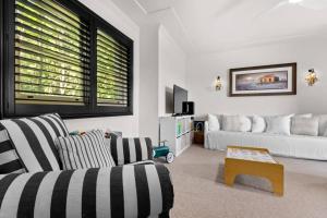 a living room with a couch and a coffee table at City Vista's at The Hill in Newcastle