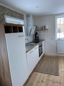 A kitchen or kitchenette at Järvsöstugan