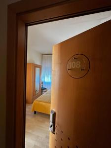 Postel nebo postele na pokoji v ubytování Hotel Ponte Molo