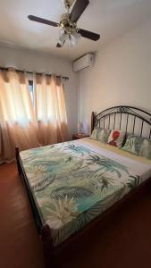 Katil atau katil-katil dalam bilik di Résidence NATANGUE 1 - Studio La Bella