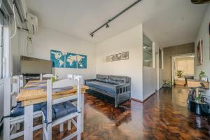 Giường trong phòng chung tại Hermoso Departamento con Balcon al Obelisco I