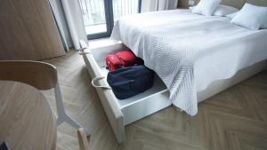 Postel nebo postele na pokoji v ubytování AVAPARTS Apartament FAMILY