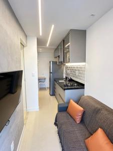 Η κουζίνα ή μικρή κουζίνα στο Apartamento lindo e completo em Salvador