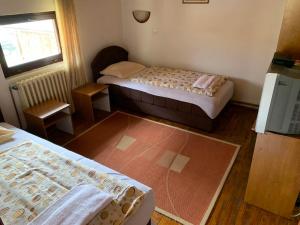 Postel nebo postele na pokoji v ubytování Vila Rakoč