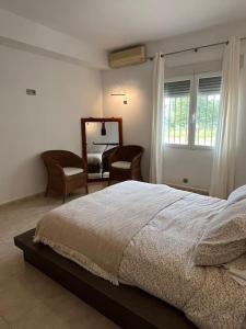 Postel nebo postele na pokoji v ubytování Casa Galiana.