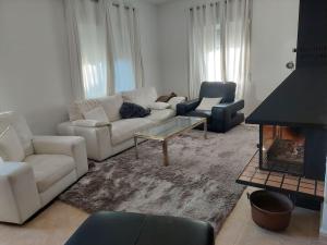 Posezení v ubytování Casa Galiana.