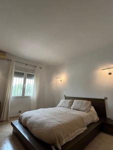 Postel nebo postele na pokoji v ubytování Casa Galiana.
