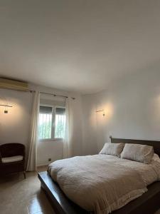 Postel nebo postele na pokoji v ubytování Casa Galiana.