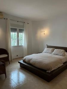 Postel nebo postele na pokoji v ubytování Casa Galiana.