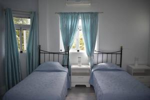 Ένα ή περισσότερα κρεβάτια σε δωμάτιο στο Villa Annabella +49 φωτογραφίες