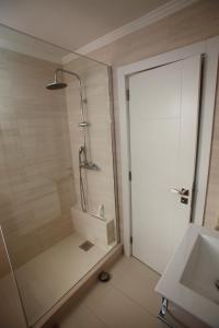 Phòng tắm tại Apartamento A Palmeira