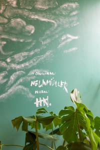 a picture of a cloudy sky with a plant at Praia FLH Hotels Ericeira in Ericeira
