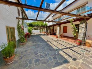Villa Arco في بالينورو: فناء داخلي لبيت بسقف زجاجي