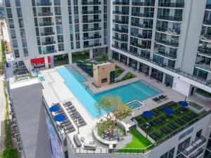 an overhead view of a swimming pool in a building at Sleek & Stylish Jr. 1-BR Retreat - Las Olas in Fort Lauderdale