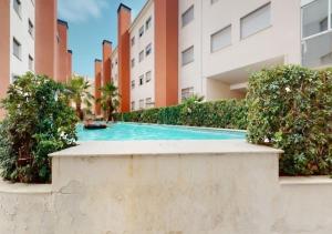 Bazén v ubytování Habitación en ático dúplex nebo v jeho okolí