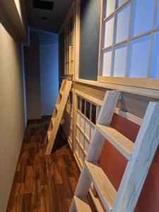 Postel nebo postele na pokoji v ubytování 大山ベースキャンプ Daisen Basecamp