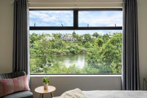 Ένα ή περισσότερα κρεβάτια σε δωμάτιο στο Fabulous River View - Brand New House In Hamilton