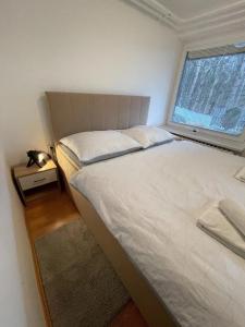 Postel nebo postele na pokoji v ubytování Apartmány Luhačovice