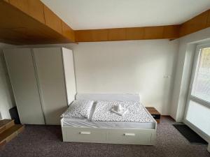 Postel nebo postele na pokoji v ubytování Apartmány Luhačovice