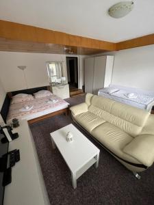 Postel nebo postele na pokoji v ubytování Apartmány Luhačovice